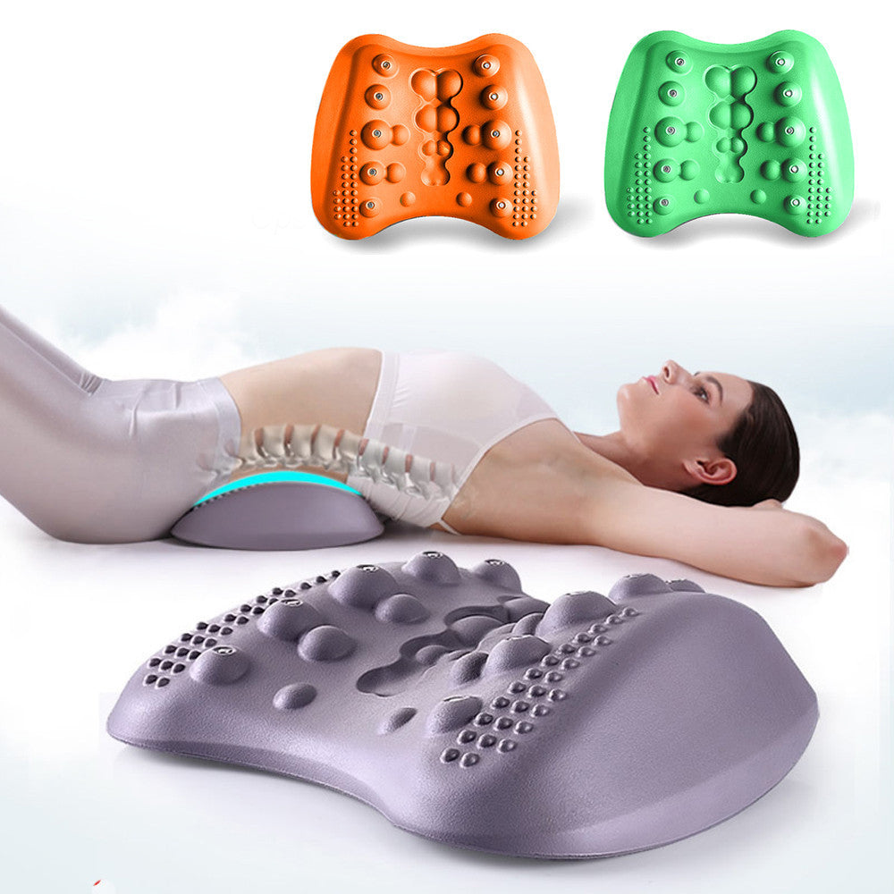 Woman lying on a massage cushion with additional cushions in orange, green, and purple displayed above and below.